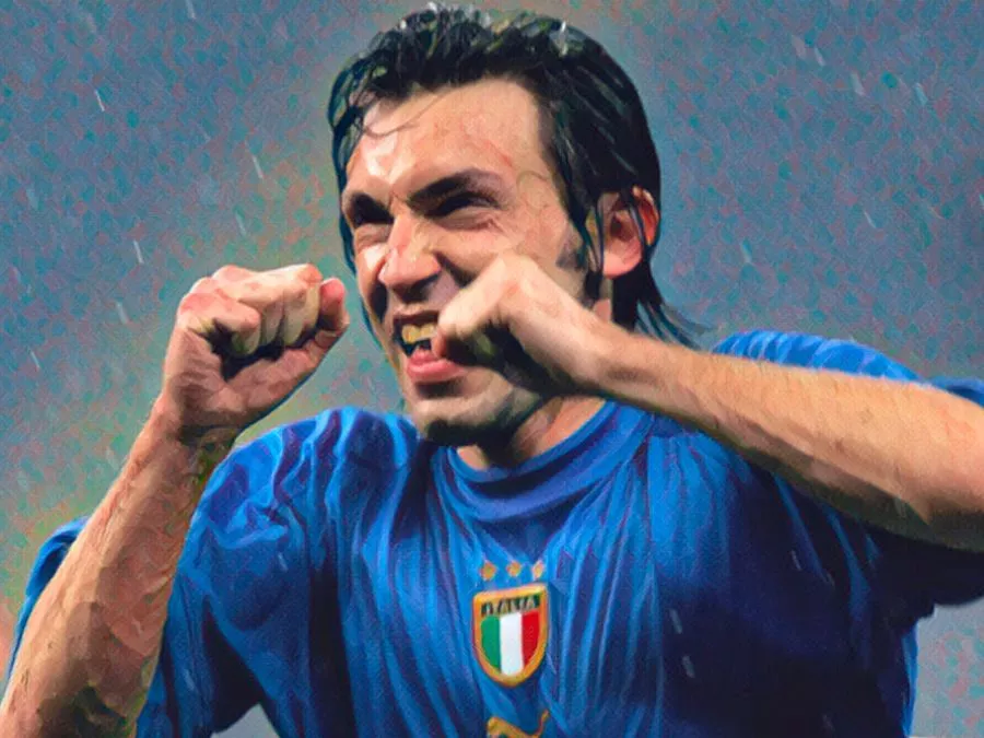 Andrea Pirlo esulta con la maglia della Nazionale dopo un gol su punizione contro la Scozia