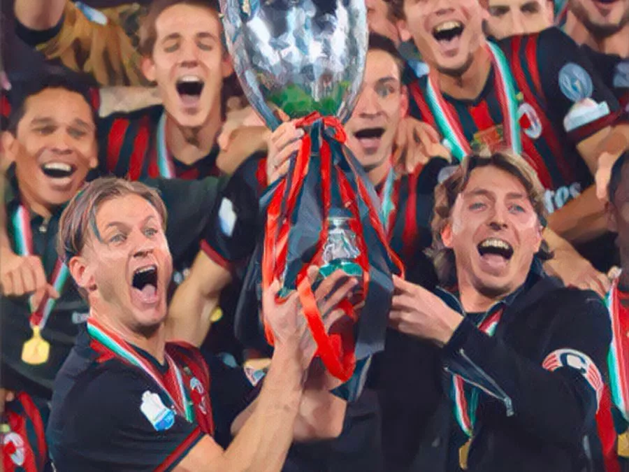 Ignazio Abate e Riccardo Montolivo sollevano la Supercoppa Italiana 2016 sul podio di Doha