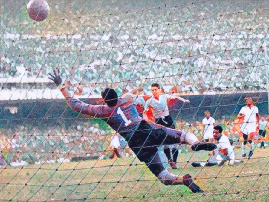 Il portiere brasiliano Barbosa immobile e sconsolato dentro la porta della rete del Maracanà, mentre i giocatori dell'Uruguay festeggiano il gol decisivo di Ghiggia il 16 luglio 1950