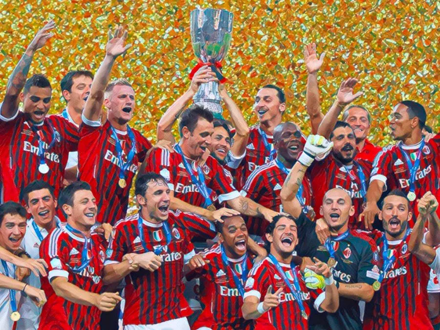 Il Milan esulta dopo la vittoria nella Supercoppa Italiana 2011 a Pechino